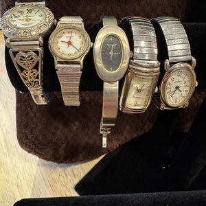 Silver Watch with Intricate Bands and Classic Faces